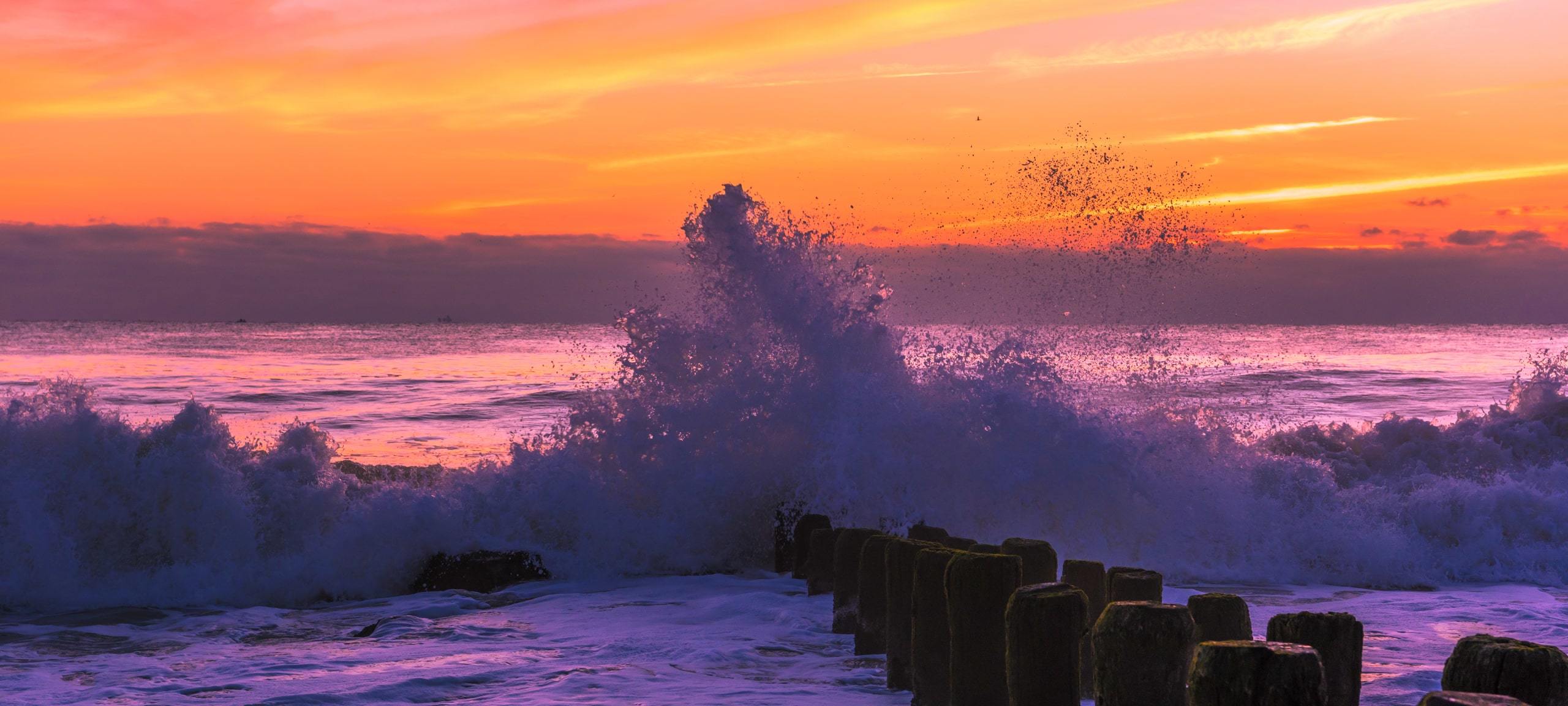 Waves crashing upon shore during sunset in Bay Head, New Jersey