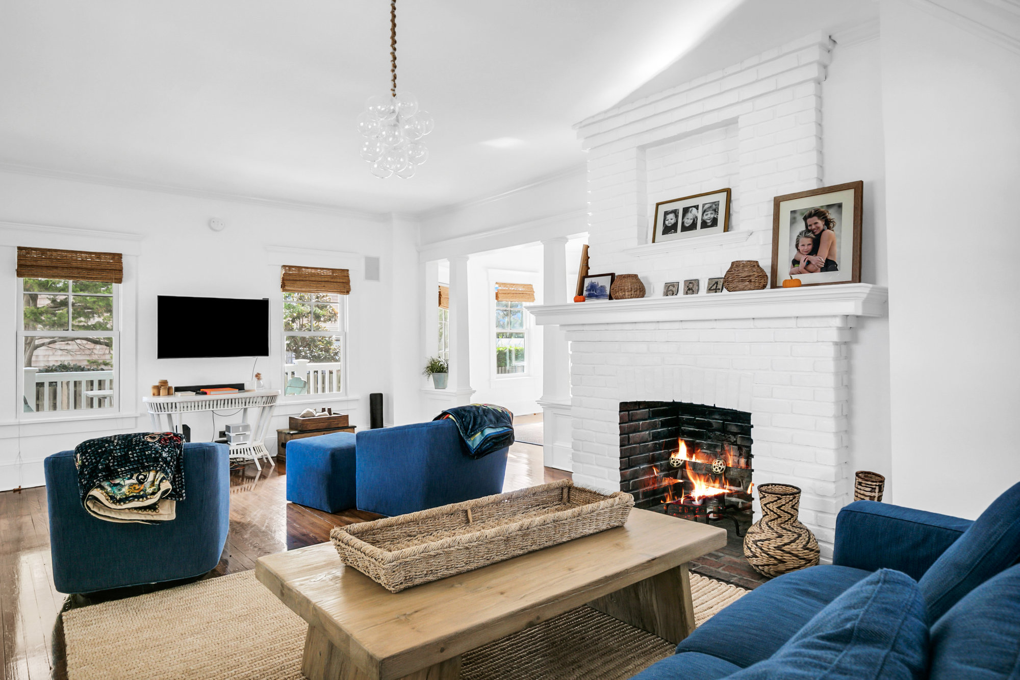 Living room with fire place in Bay Head 