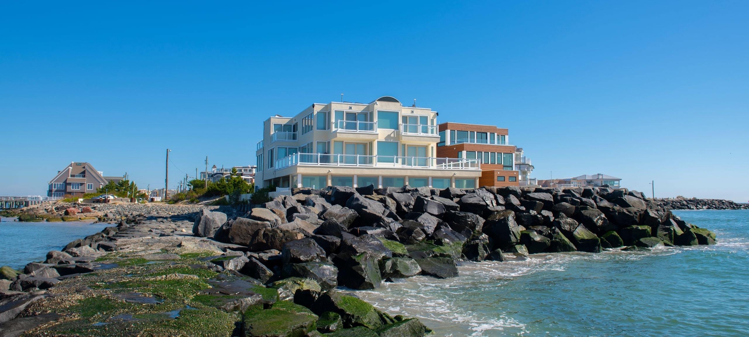 Luxury bayfront home in Jersey Shore, located on rocky shoreline