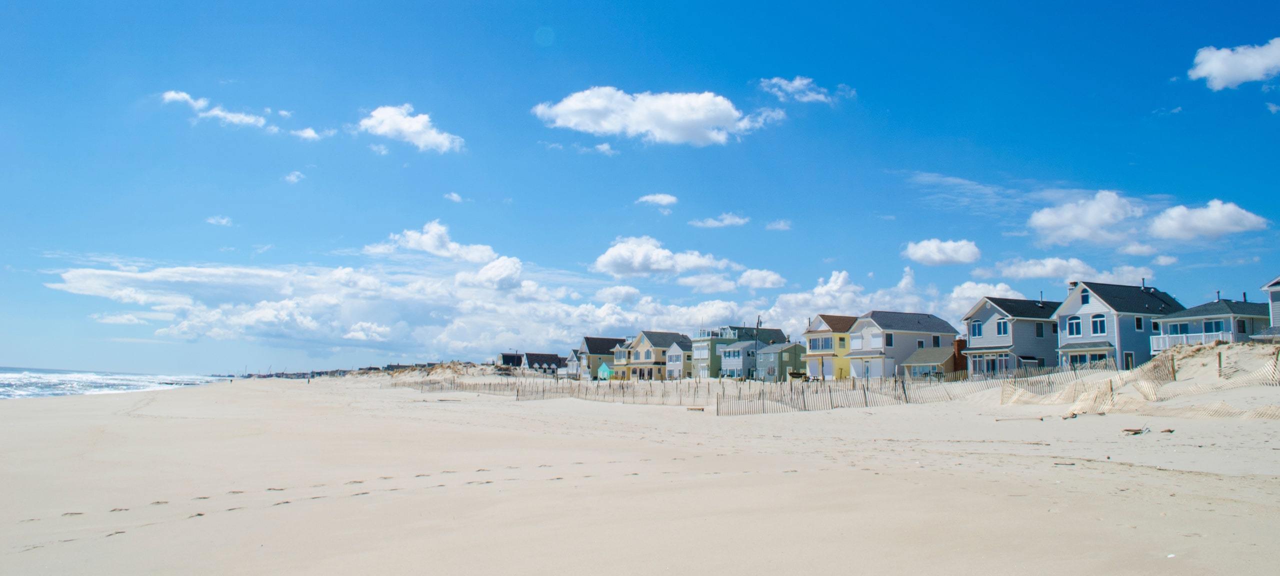 Colorful row of houses on the sunny Lavallette, NJ beach