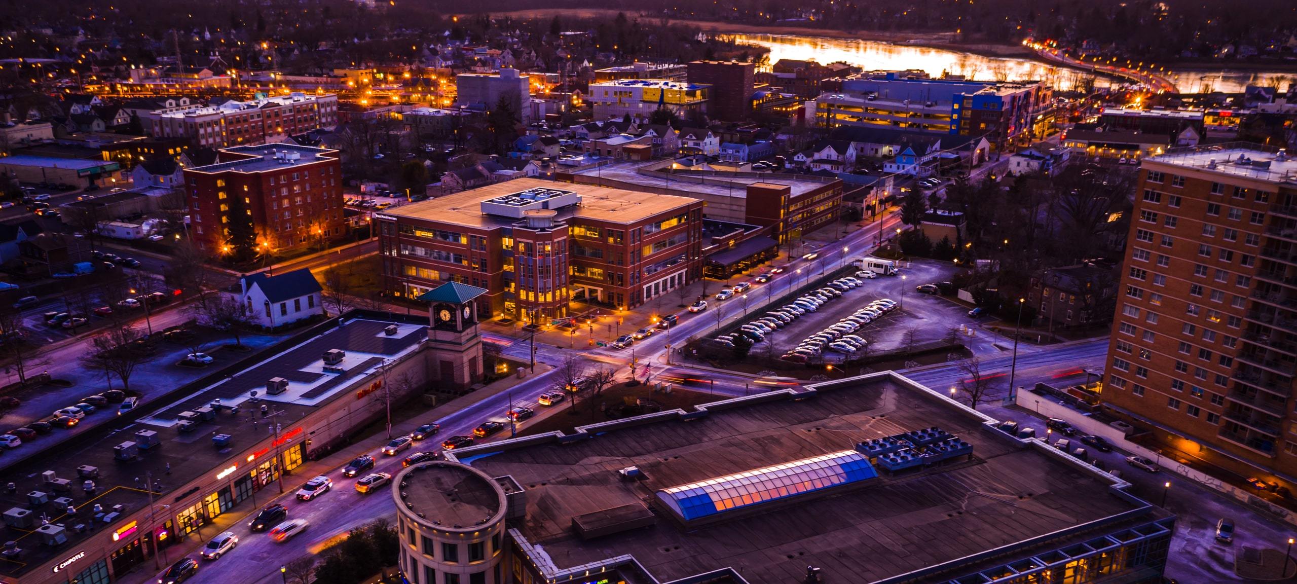 Aerial view of Red Bank, NJ commercial area during twilight