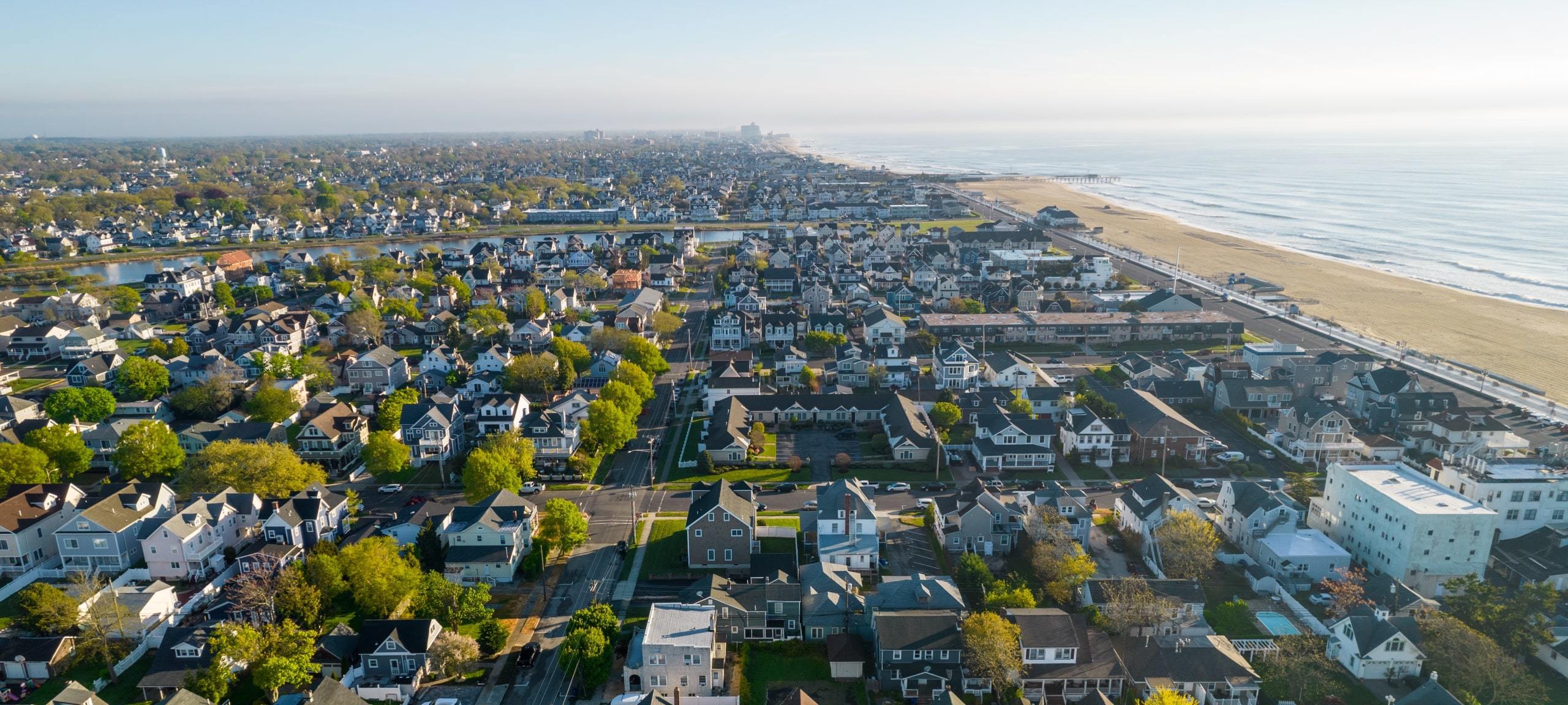 Aerial view of luxury beach homes along the Jersey Shore during summer